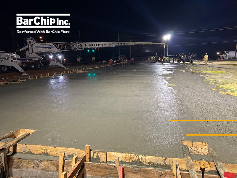 Concrete being placed for monolithic slab.