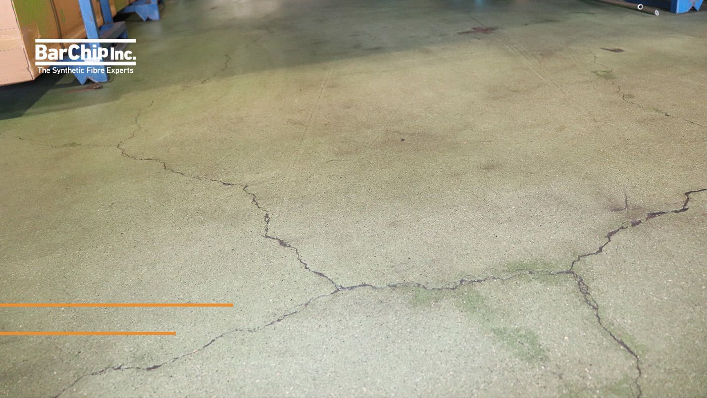 24-year comparison of fibre reinforced and steel mesh reinforced concrete warehouse floors
