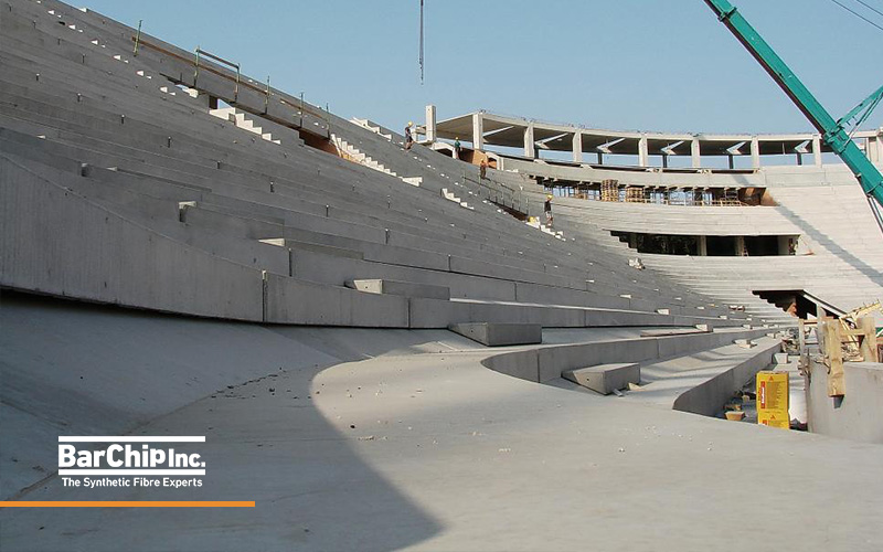 Prestressed precast concrete seating bowl under construction at Debrecen Stadium.