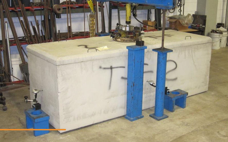 CCIS static load testing of fibre reinforced concrete burial vault.